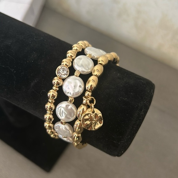 Jewelry - Gold tone 3- piece 
Set hammered oval and imitation pearl stretch bracelets